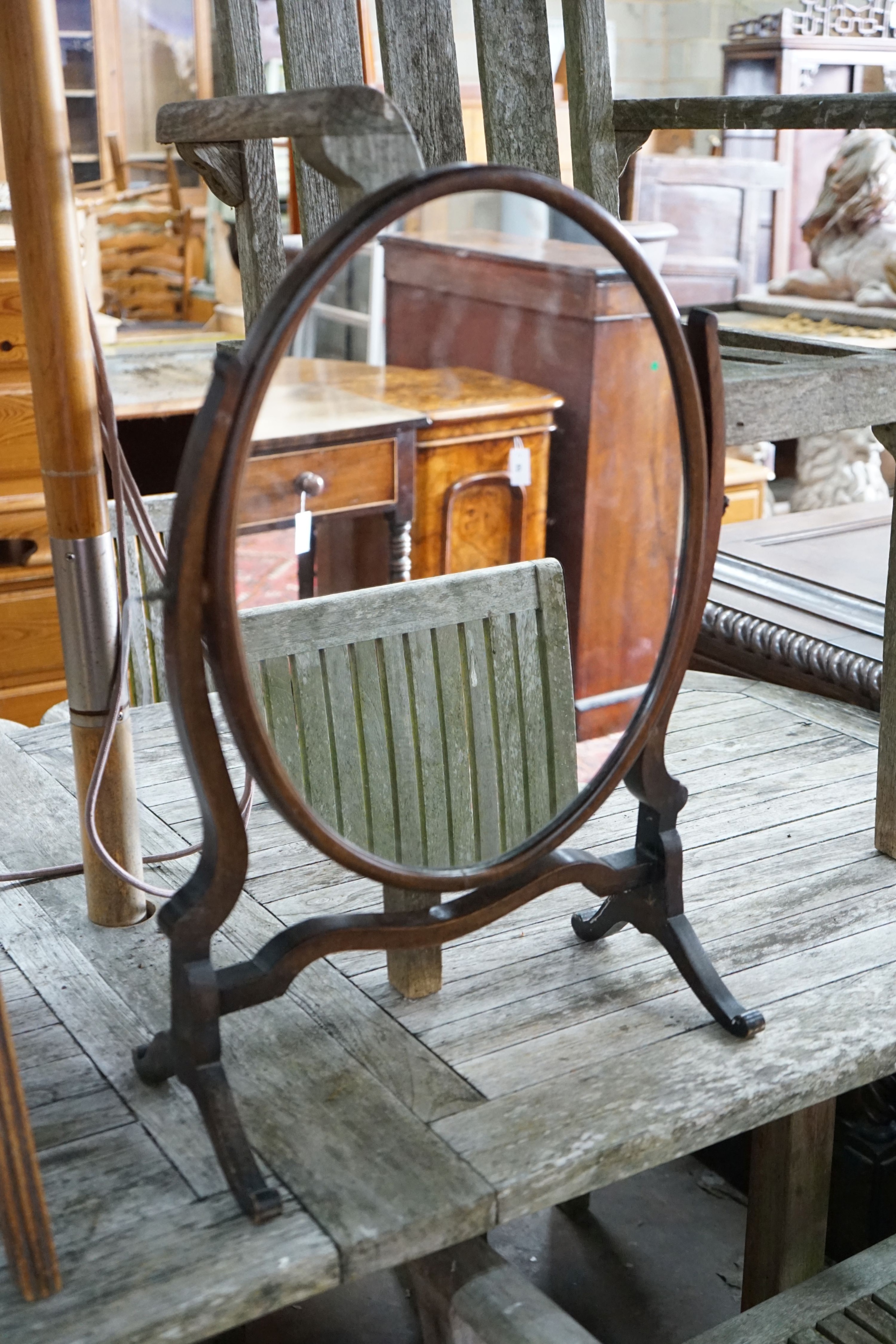 A Victorian mahogany toilet mirror, height 55cm together with a later skeleton framed toilet mirror